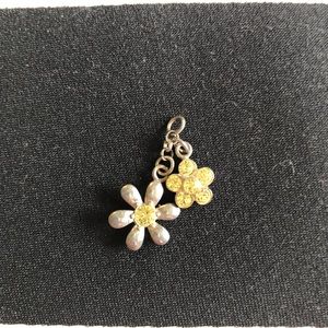 Sterling Silver with Yellow Crystal stones of Two Flower Charms. Very pretty